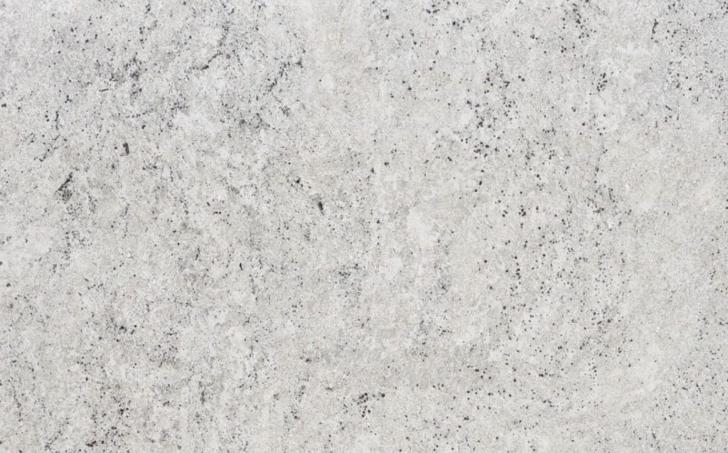 Đá Colonial White - Một loại đá granite trắng từ Ấn Độ với nền trắng kem pha trộn với các đốm đen và hồng ngọc.